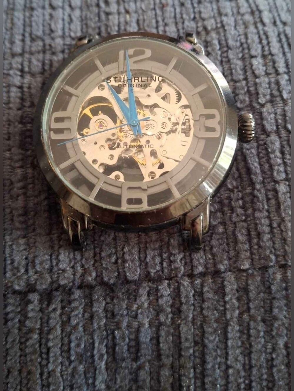 Stuhrling Original Silver Skeleton Watch with Blue Hands